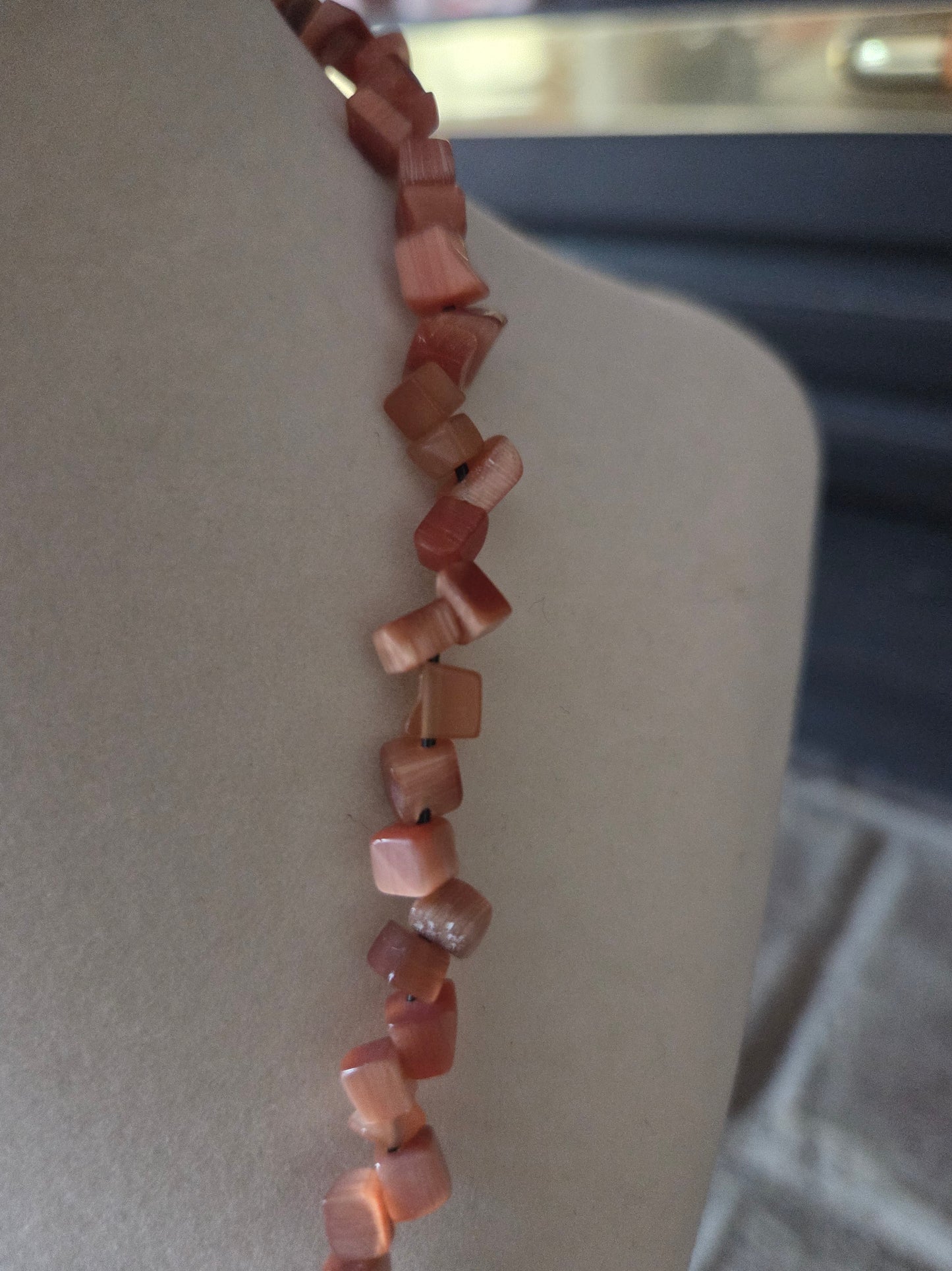 Orange Eye chip stretch necklace approx 12 in long