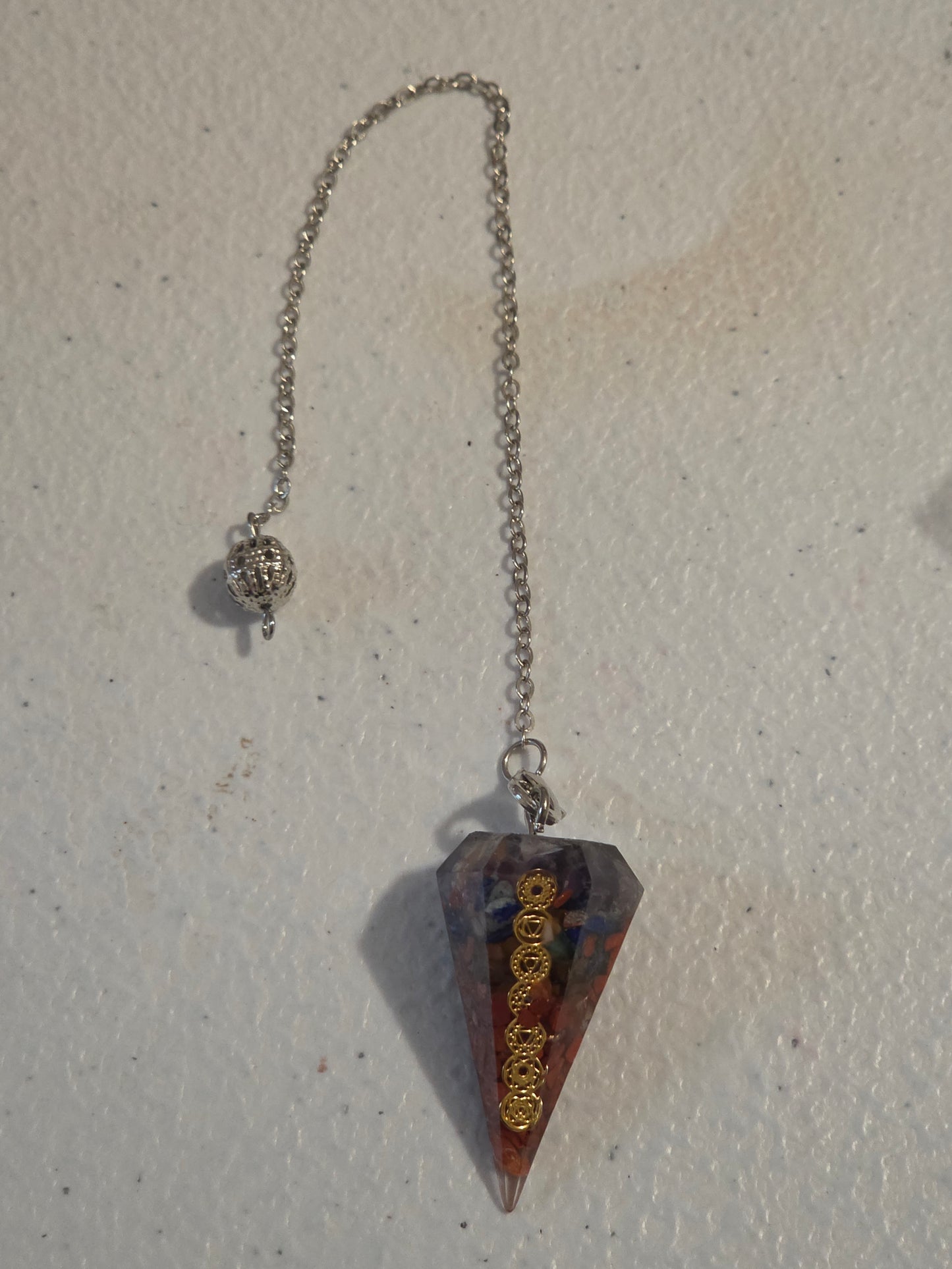 Pendulum with stones and Chakra symbols