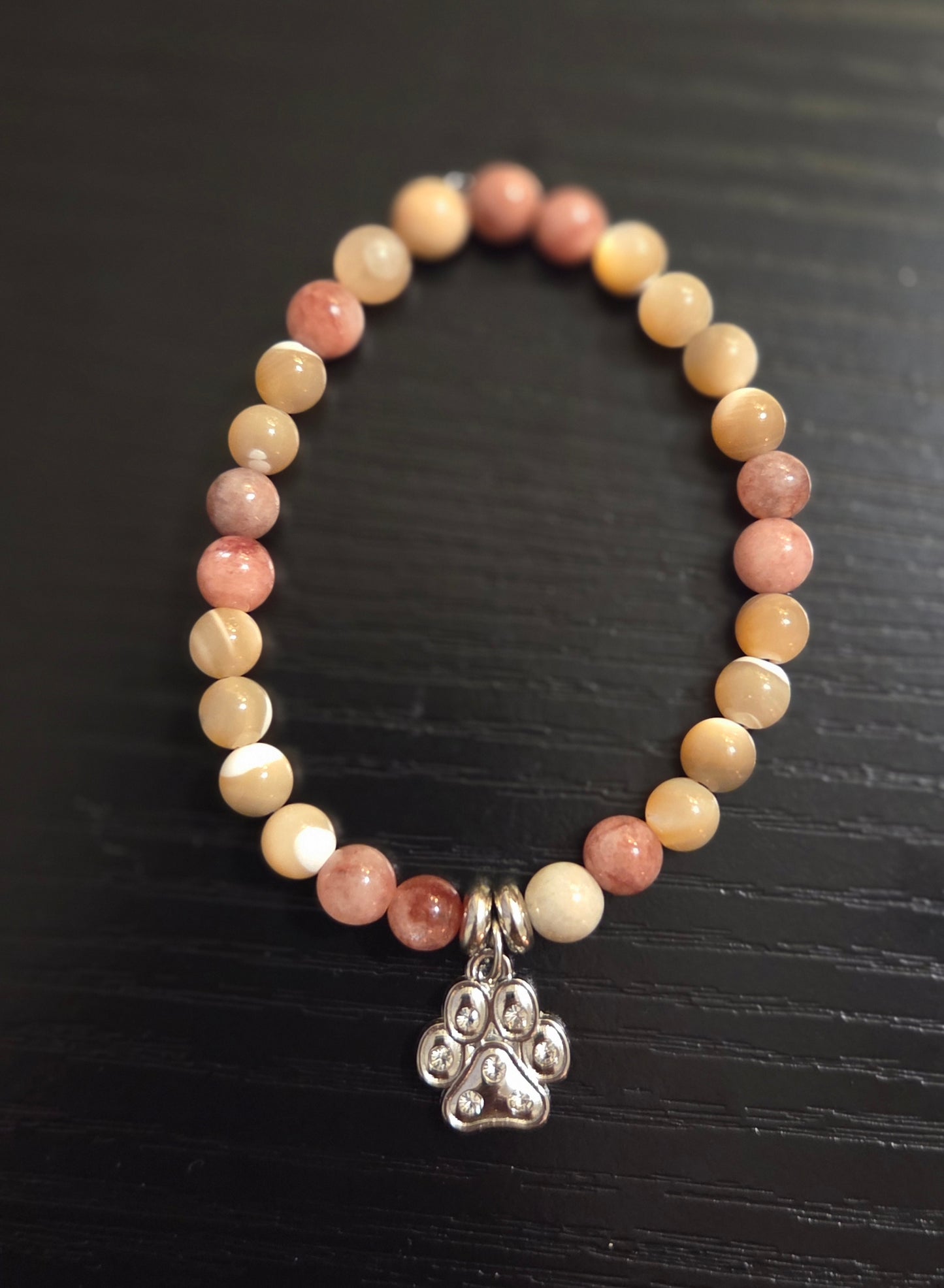 Sunstone and Mother of Pearl with paw charm