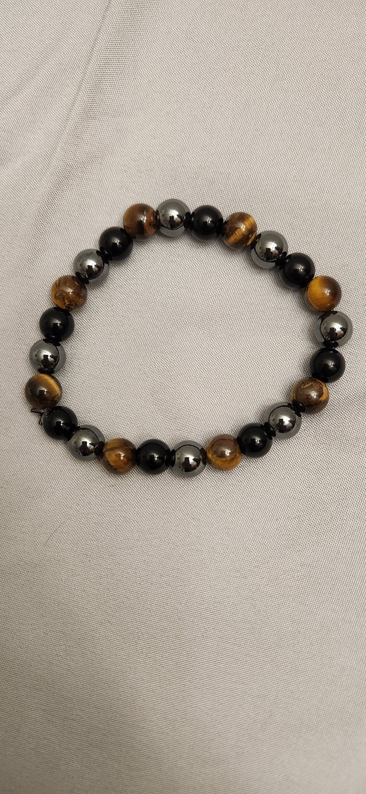 Hematite, Tigers eye, and Obsidian
