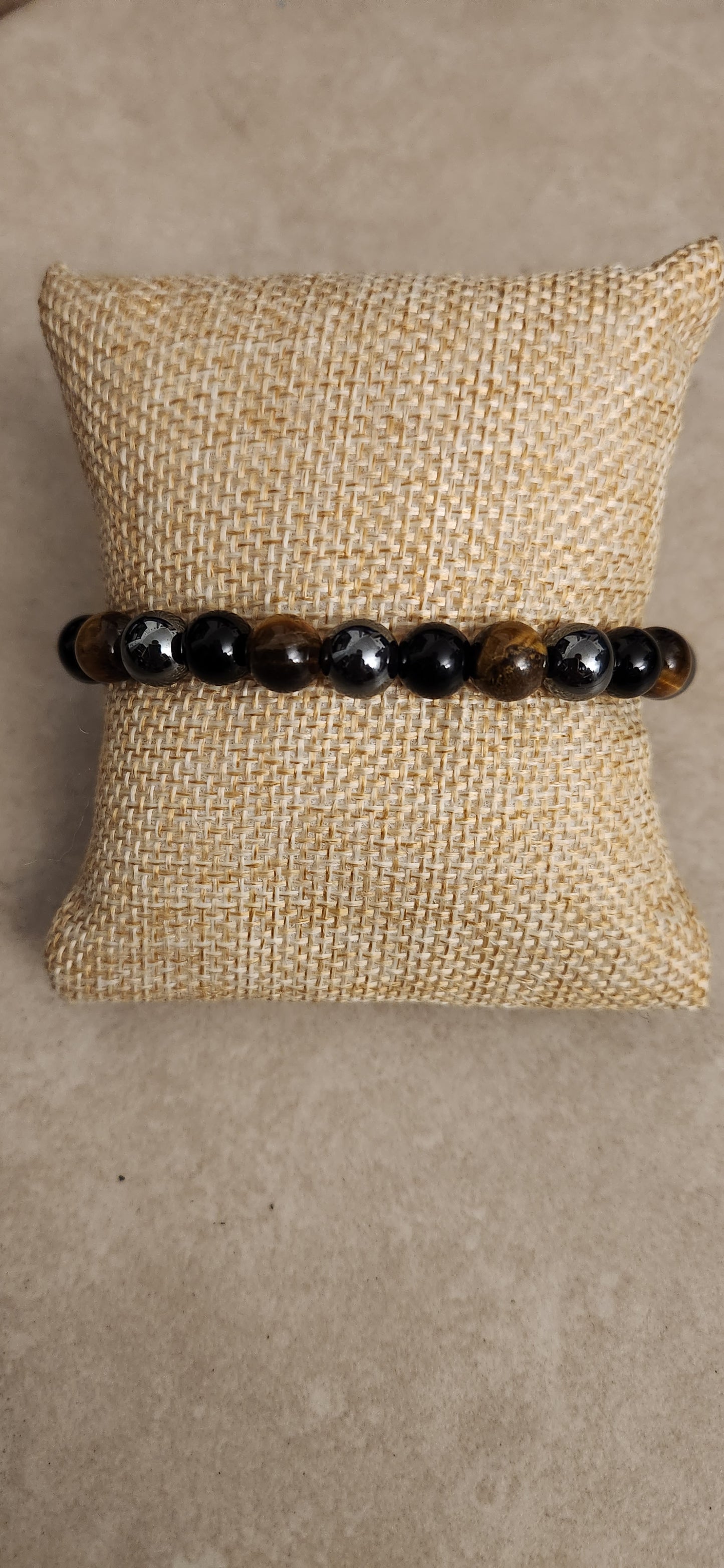 Hematite, Tigers eye, and Obsidian