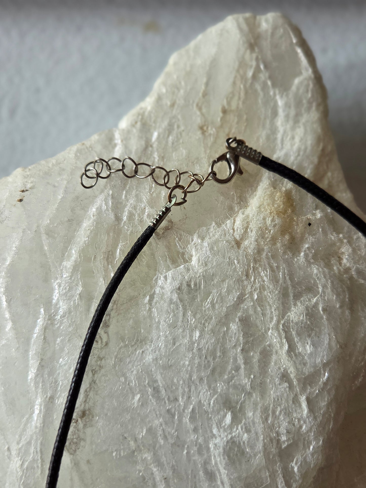 Tektite in cage necklace