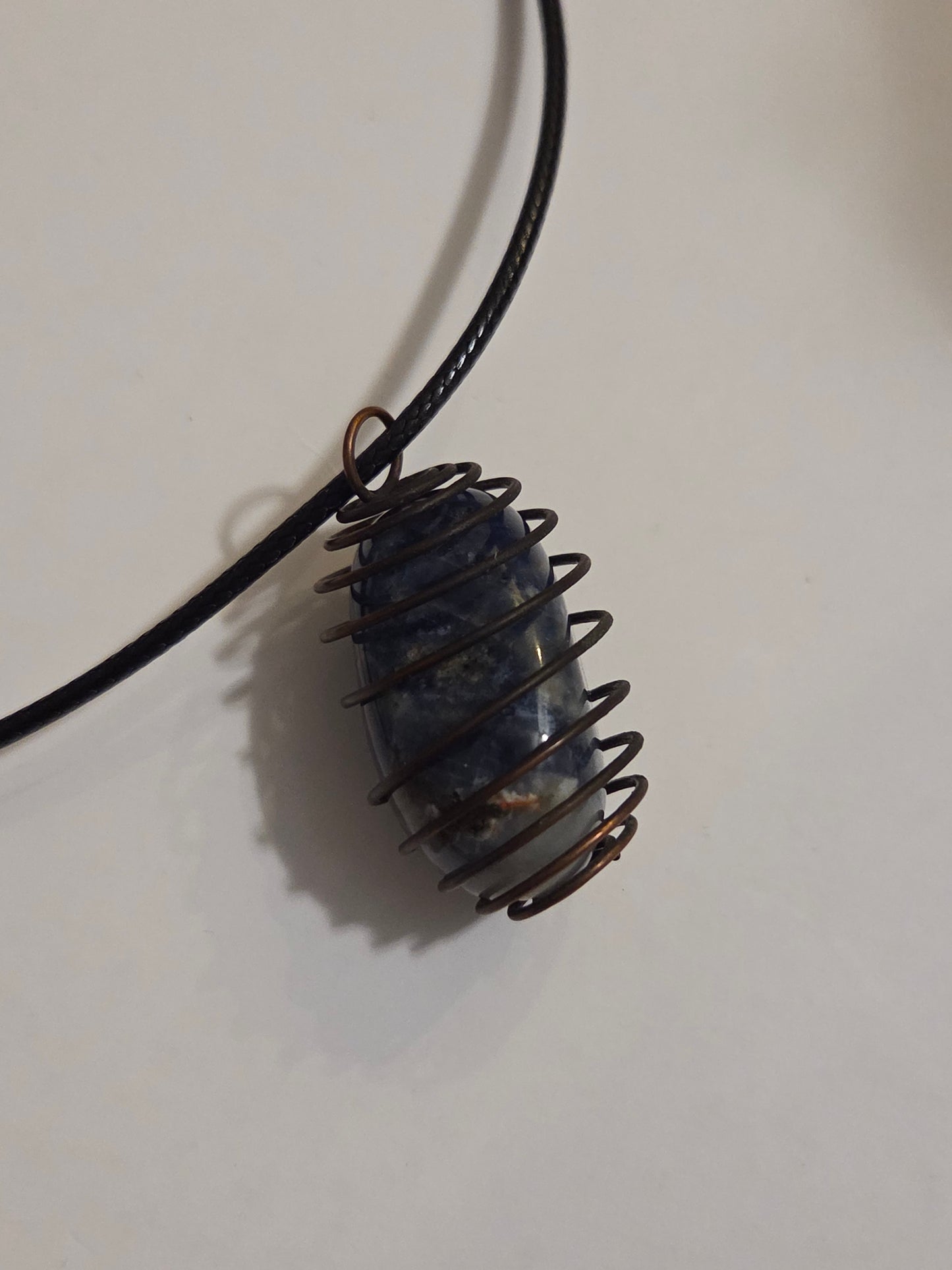 Sodalite in cage necklace