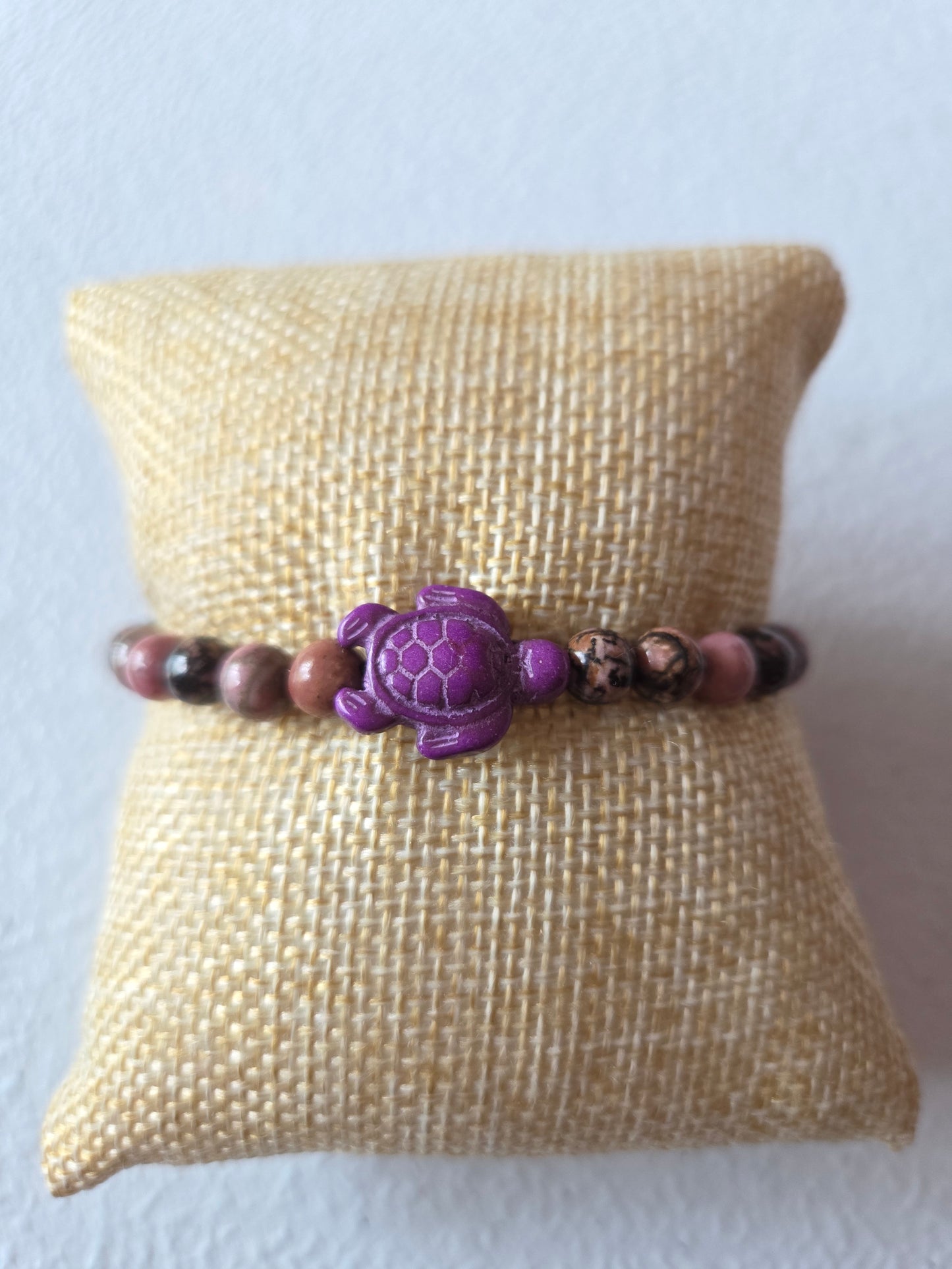 Haitian Flower Rhodonite with purple sea turtle