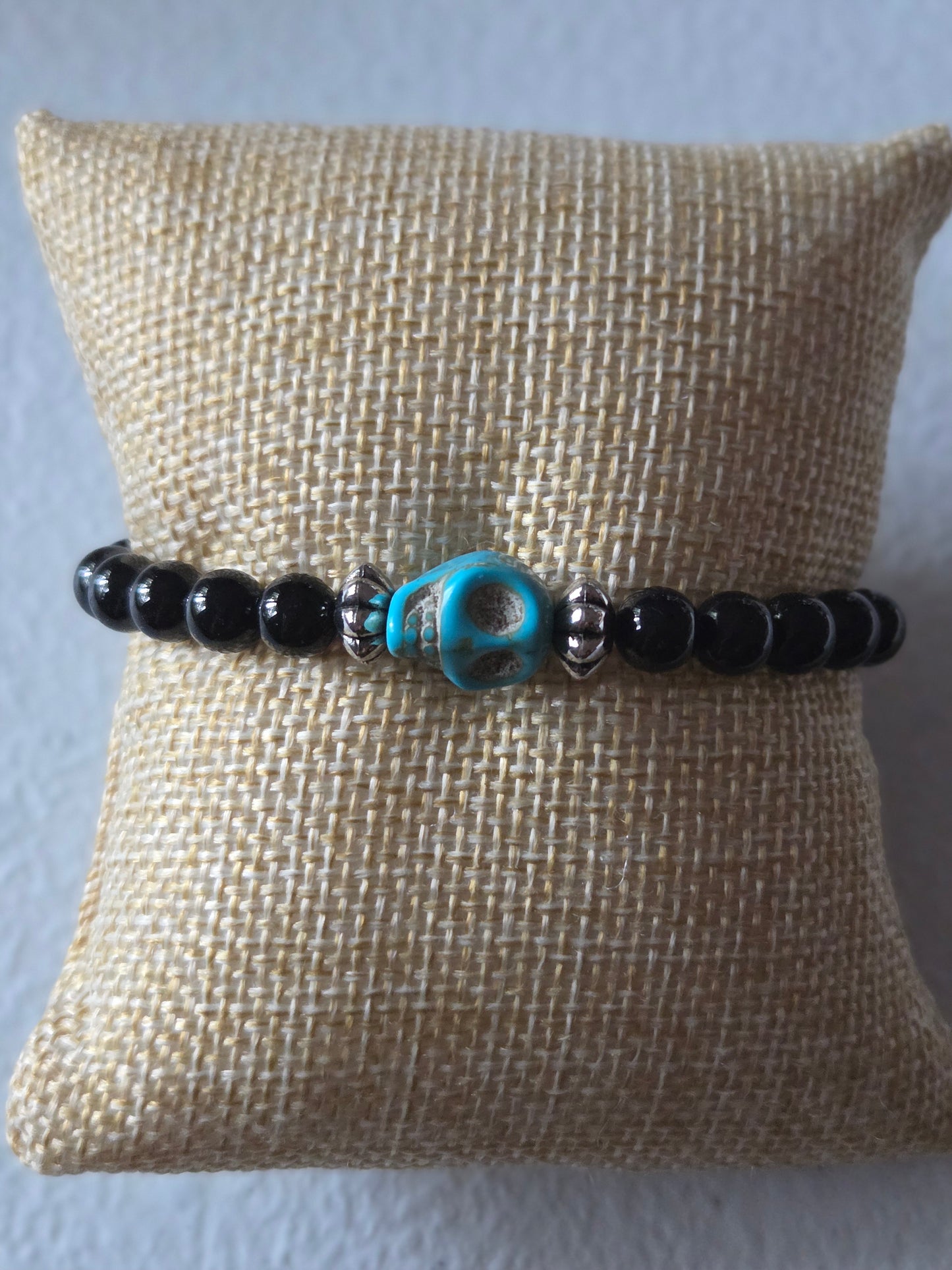 Obsidian with Blue skull charm and silver bead accents