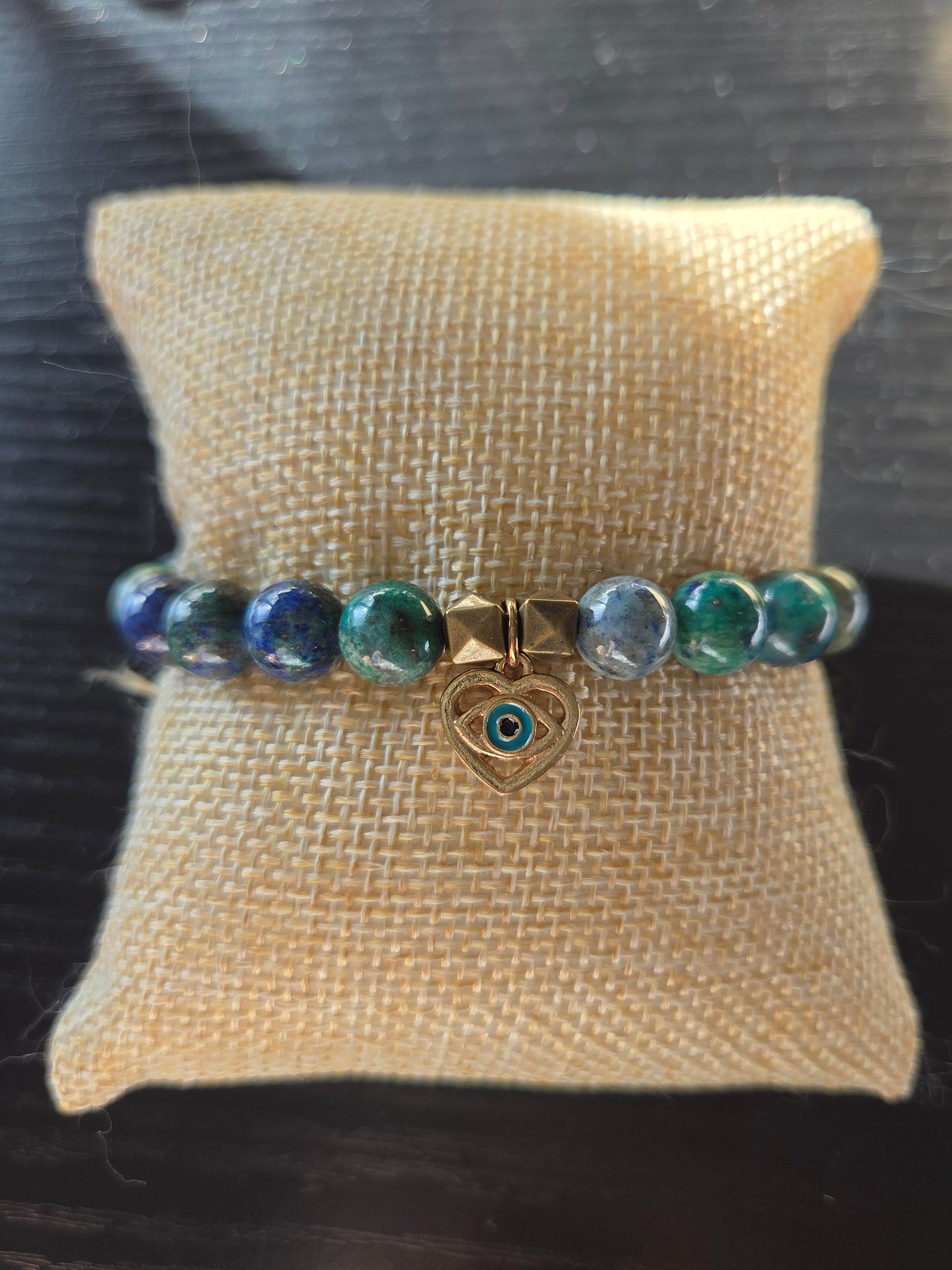 Chrysocolla and Azurite in Lapis with evil eye charm