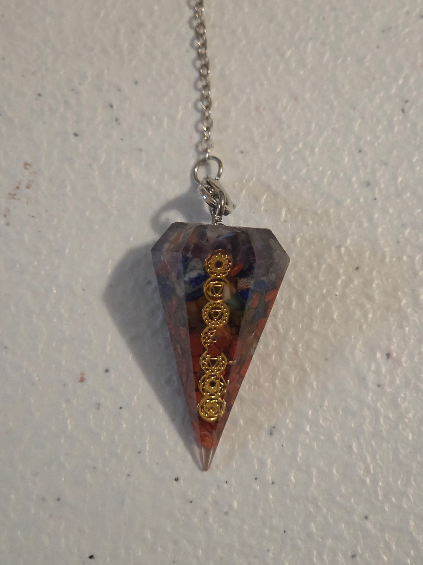 Pendulum with stones and Chakra symbols