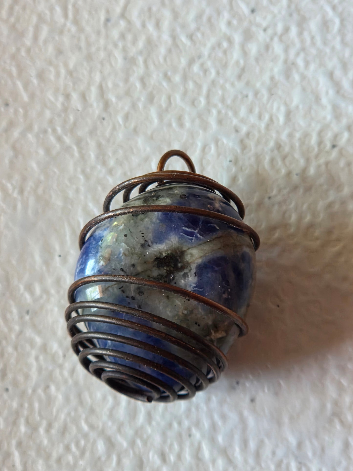 Sodalite in cage necklace