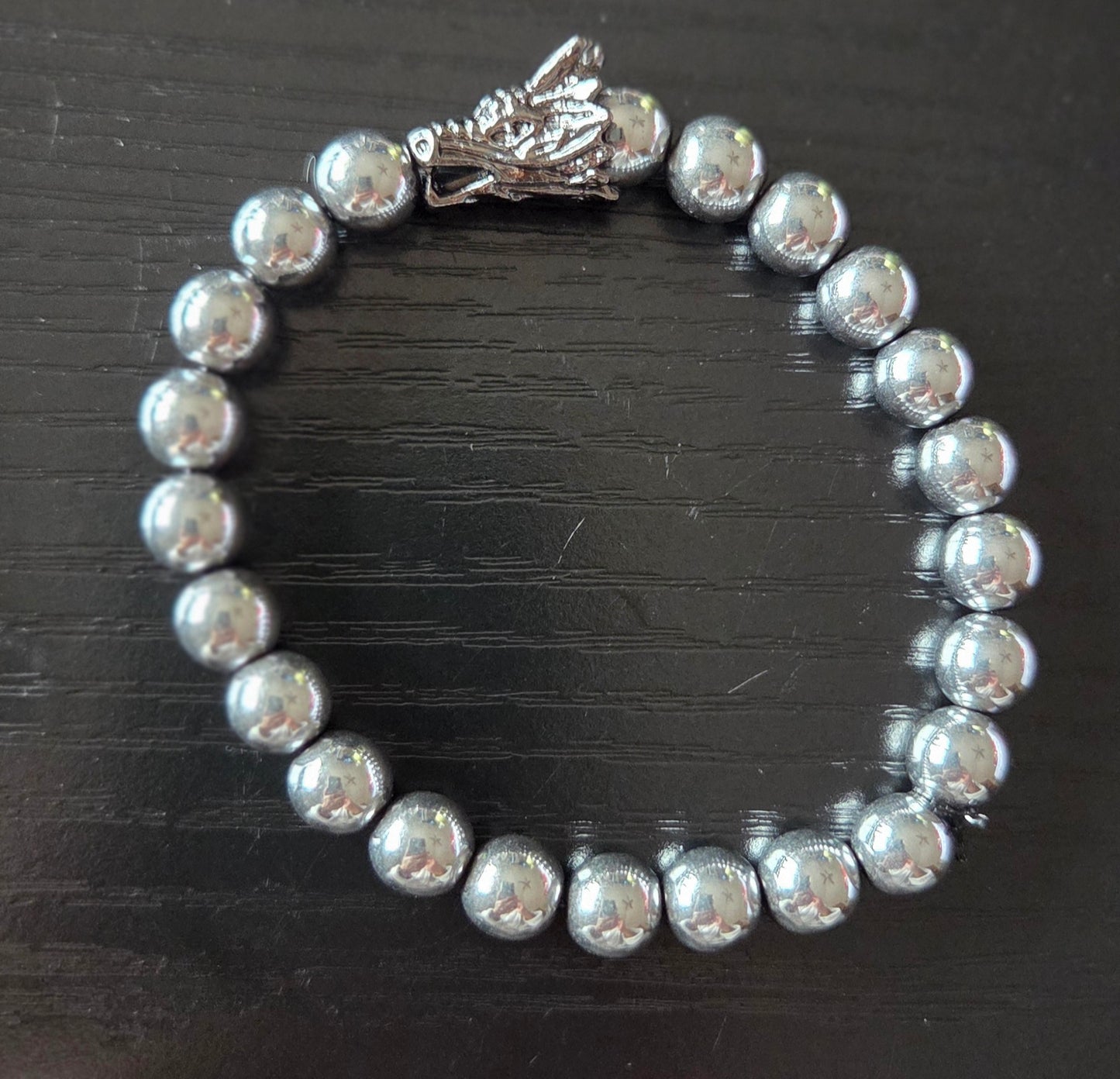 Hematite bracelet with Dragon head charm 8mm beads