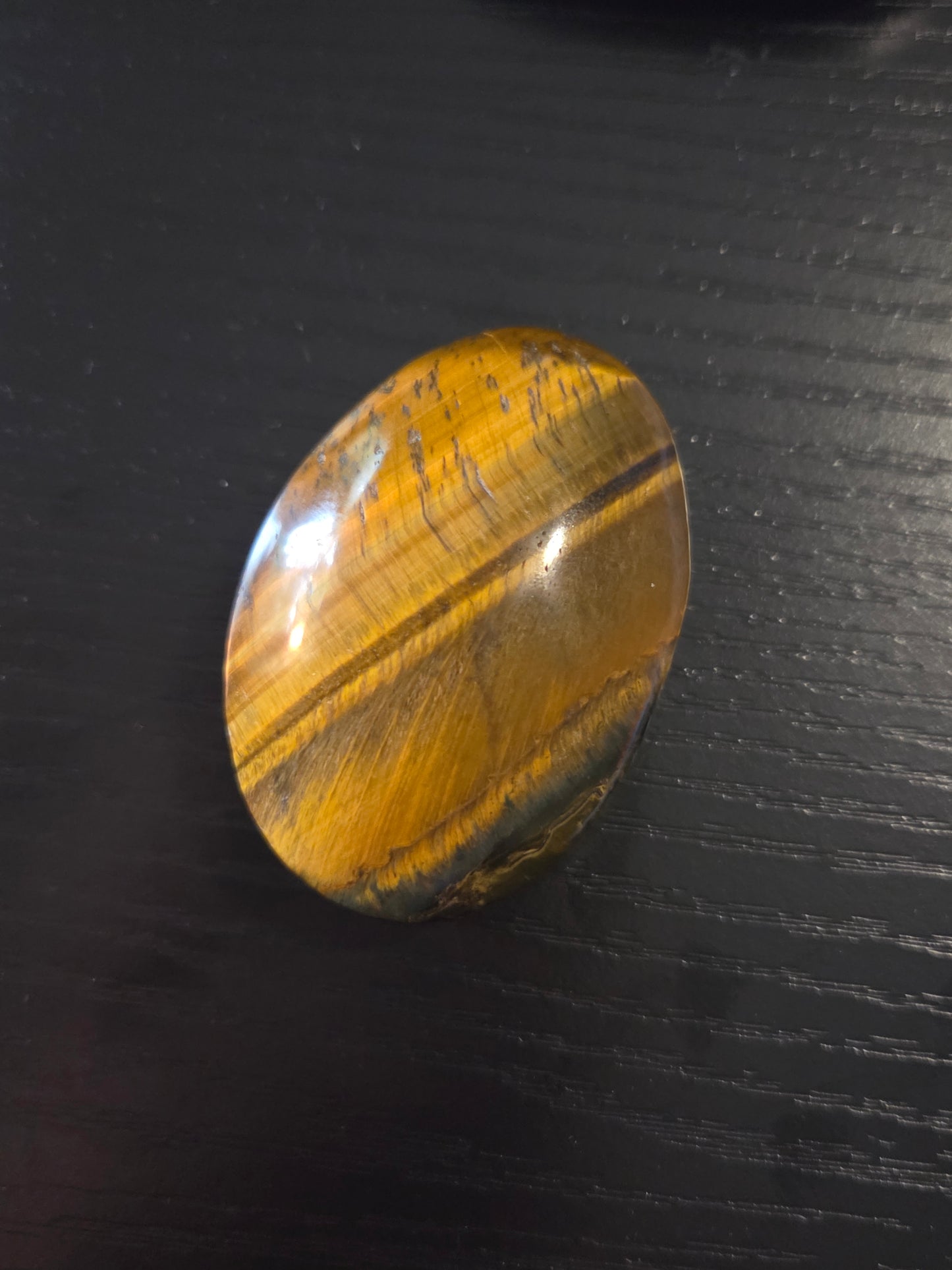 Blue gold Tigers eye palm stone