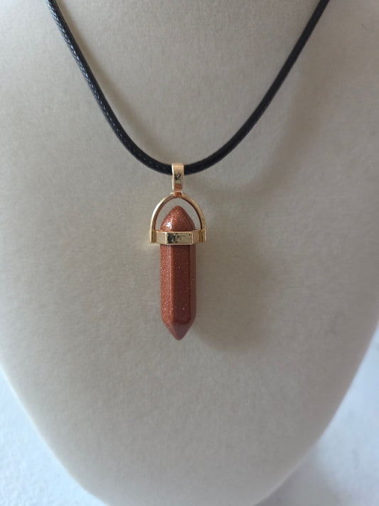Goldstone pendant with cord