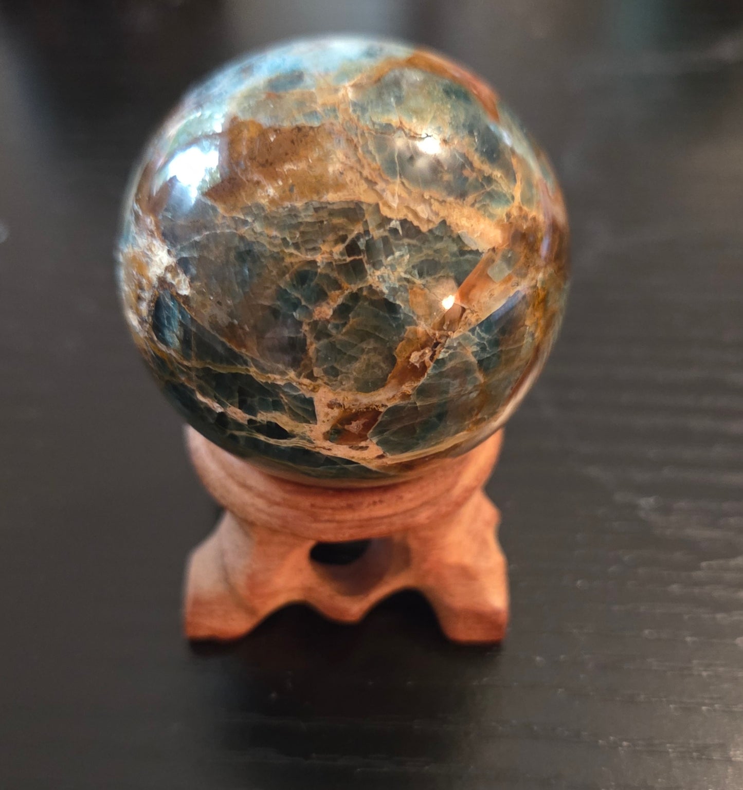 Small Blue Apatite sphere with Rosewood stand